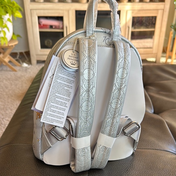 Collectible Disney 100 Loungefly Silver Character Backpack - Picture 3 of 5
